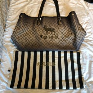 Large beautiful grey/black L.A.M.B. travel bag.